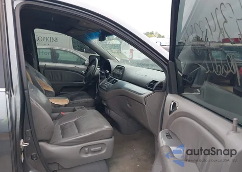 2010 Honda Odyssey Ex-L z USA, uszkodzony, nr VIN 5FNRL3H69AB087179
